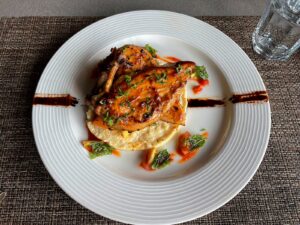 Niraamaya BBQ chicken with polenta
